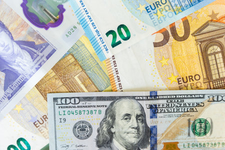 close up of a dollars and euro. Background from different banknotes, International Finance, currencies from around the worldの写真素材