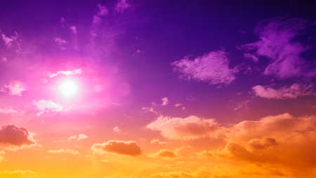 colorful wallpaper purple orange blue pink sunset sky cloud. Dramatic sunset sky background. Sun Sets Over Horizon. Amazing Coral Pink Red Summer Cloud at Sunset. Beautiful Relaxの写真素材