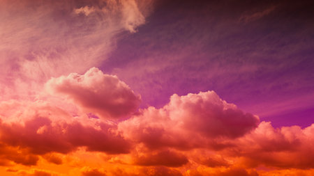 beautiful vivid Coral purple orange Sky wallpaper at Sunset with clouds. darmatic Sunshine sky, Beautiful View, evening clouds fast moving awayの写真素材