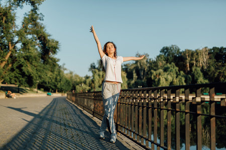 Fitness Healthy Lifestyle Young Woman make a break after running in the forest. Caucasian brunette female exercising outdoor, Sport lifestyle.の写真素材