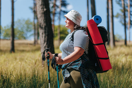 Experience the Wanderlust Chronicles of an American Hiker, a Plus-Size Woman, Sharing Stories of Outdoor Exploration. Witness the Solo Odyssey of a Plus-Size Woman Venturing Alone intoの写真素材