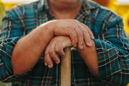 Hands of Harvest Close examination of an aged farmers hands, actively engaged in the agricultural process. Farming Finesse A close up perspective highlighting the intricate and weathered handsの写真素材
