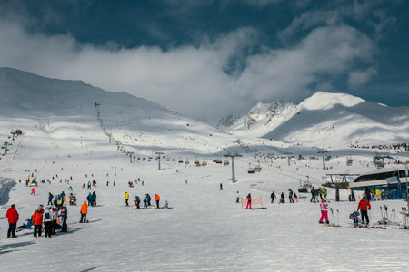 Experience the Winter Wonderland Enjoy an exciting skiing adventure in the snowy mountainsの写真素材