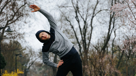 Athletic Man Braving the Rain During Intense Training Session