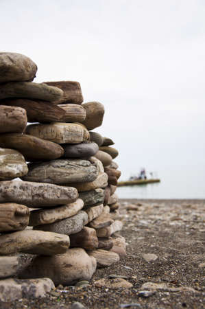 stone on sea shore closeupの写真素材