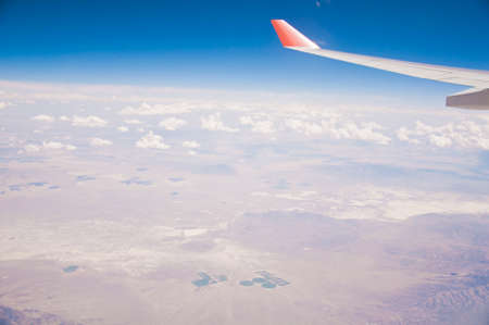 under the wing in air against the background blue skyの写真素材