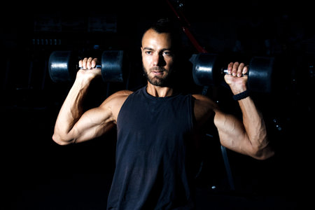 Portrait of a super fit young man working out.