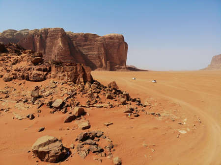Amazing view from above on the huge, red, hot and very beautiful desert Wadi Rum. Kingdom of Jordan , Arab country in Western Asiaの写真素材