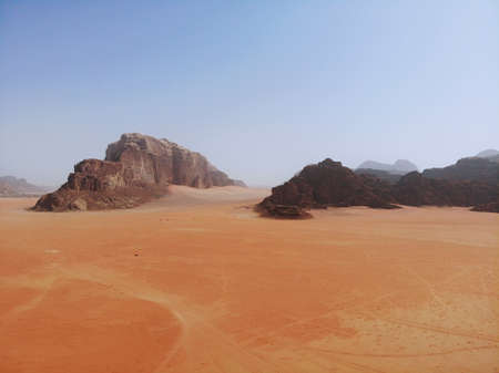 Amazing view from above on the huge, red, hot and very beautiful desert Wadi Rum. Kingdom of Jordan , Arab country in Western Asiaの写真素材