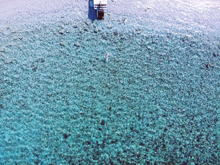 Swimming on the sea. Summertime holiday, happy moment in unity with nature. Amazing view from above. North part of Cyprus, Girne.の写真素材