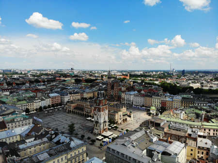 Aerial photo from drone. The culture and historical capital of Poland. Comfortable and beautiful Krakow. The land of Legend. Old part of town,Main square, St. Mary's Basilica.の写真素材