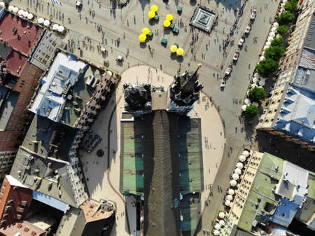 Aerial photo from drone. The culture and historical capital of Poland. Comfortable and beautiful Krakow. The land of Legend. Old part of town,Main square, St. Mary's Basilica.の写真素材