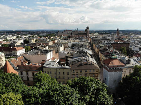 Aerial photo from drone. The culture and historical capital of Poland. Comfortable and beautiful Krakow. The land of Legend. Old part of town,Main square, St. Mary's Basilica.の写真素材