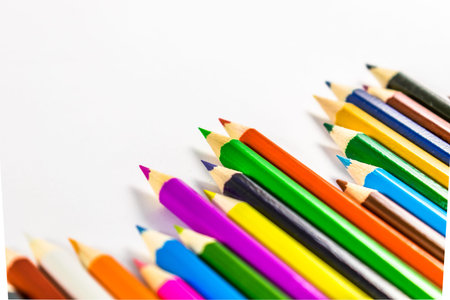 School supplies colored pencils in a row