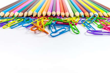 Colored pencils and paper clipsの写真素材