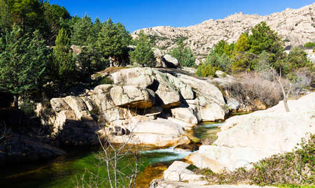 Cascade falls over big rocks on Spanish mountains, landscapeの写真素材