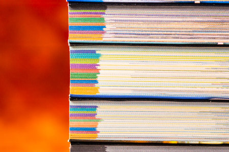 Detail of a pale of coloured books