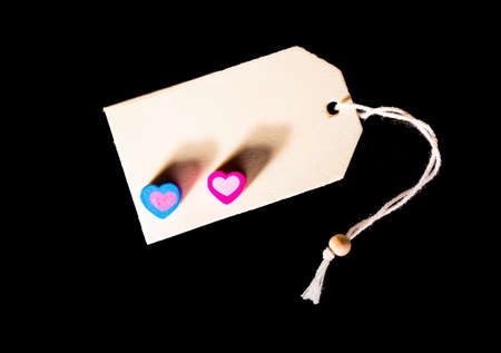 Love message  Two little hearts with copy space on blackの写真素材