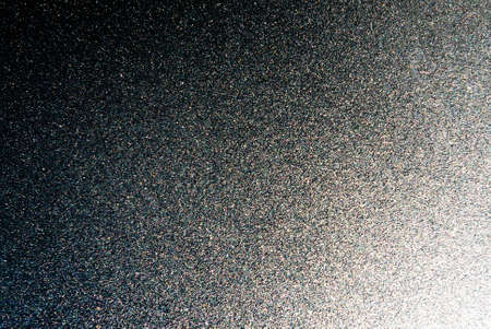 Rough texture of ice frozen on glass.の写真素材