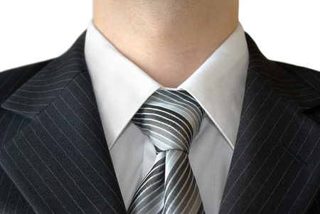 Man in a business suit closeup isolated on white background.の写真素材