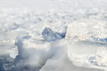 Glare of light reflected in the shards of pure ice.の写真素材