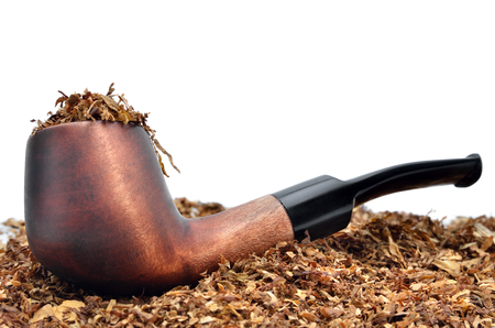 Smoking pipe and tobacco isolated on white backgroundの写真素材
