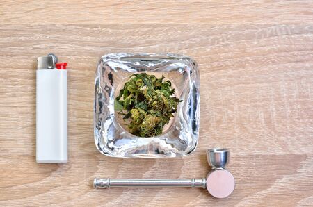 Dry cannabis inflorescences and medical marijuana smoking devices.の写真素材