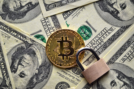 Bitcoin cryptocurrency is protected by a lock, unlike the US dollar