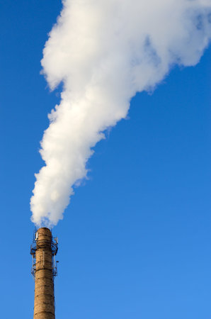Harmful emissions into the atmosphere from industry. Greenhouse gases and glabal warming.