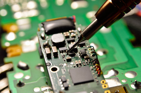 Repair of electronics, microchips and microcircuits close-up