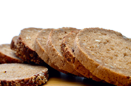 Slices of fresh bread, bakery products, pastries close-upの写真素材