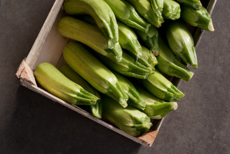 Crate full of fresh zucchiniの写真素材