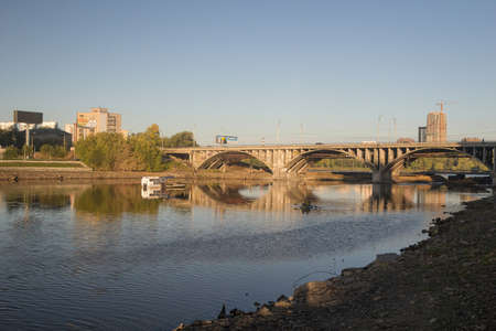 Makarovsky bridge in the city of Yekaterinburg, against the background of the embankment and the river Isetのeditorial素材