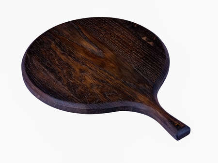 Empty cutting board in dark oak wood isolated on whiteの写真素材
