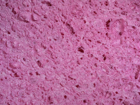 Abstract texture of a pink washing spongeの写真素材
