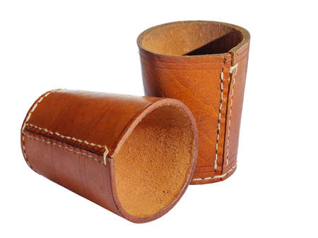 Two empty leather dice cups isolated on whiteの写真素材