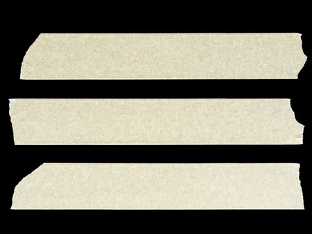 Set of 3 yellow duct tape isolated on black backgroundの写真素材