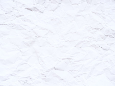Background of crumpled white paper as an abstract textureの写真素材