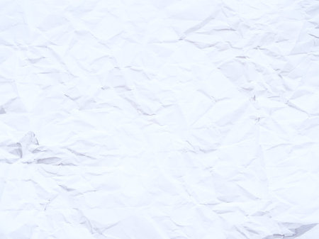 Texture of crumpled and wrinkled white paper as a backgroundの写真素材