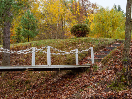 Iron bridge over a dried up lake to the steps going upの写真素材