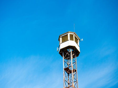 Old observation tower against the blue skyの写真素材