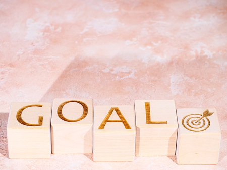 Text GOAL and target symbol as business motivation concept