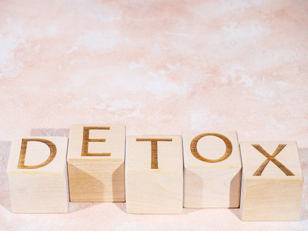 Wooden cubes with the word DETOX as a cleanse conceptの写真素材