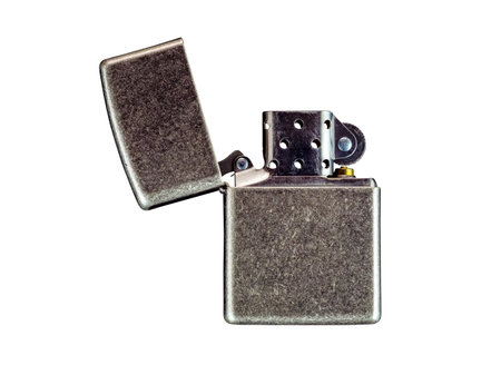 Close up old fashioned vintage lighter isolated on white backgroundの写真素材
