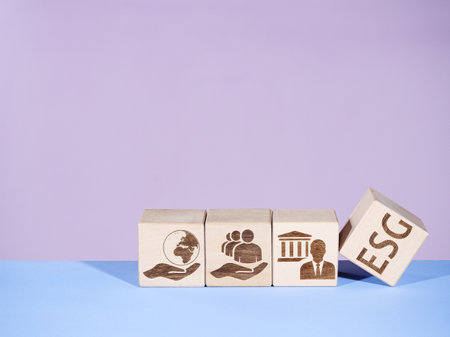 ESG symbols on wood blocks as a concept of the environmental conservation principlesの写真素材