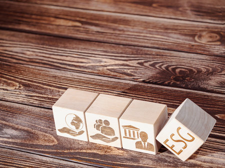 ESG symbols on wooden board as a concept of corporate business management principles and criteriaの写真素材