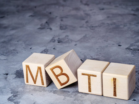 MBTI text on wooden cubes as a concept of psychological testing for career and personal growthの写真素材