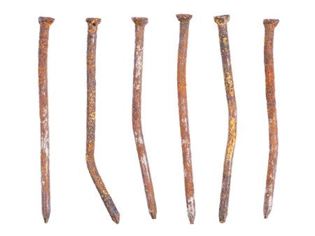 Old rusty nails close-up, isolated on white backgroundの写真素材