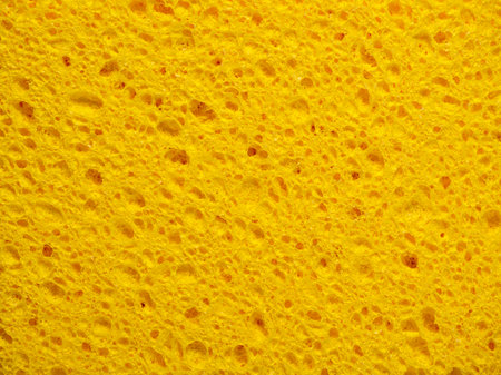Abstract background with detail texture of yellow wash spongeの写真素材