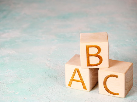 ABC text on wood blocks as literacy conceptの写真素材